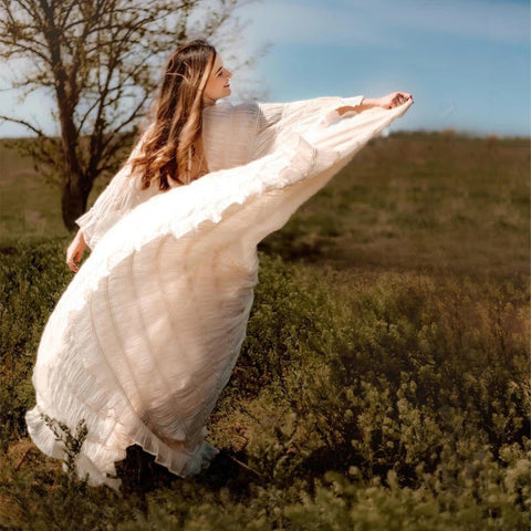 "Bohemian Reverie: A Freedom-Inspired Maternity Photoshoot Dress"